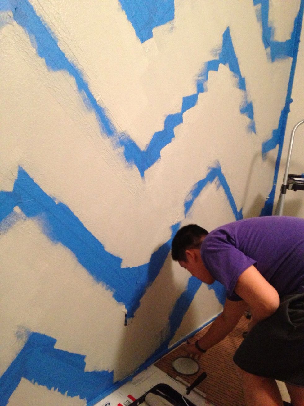 Put down your drop cloth and start painting. Since you've completely taped off everything, you can just go for it!!! It is faster that way. Give it about 10 minutes and then peel off the tape.