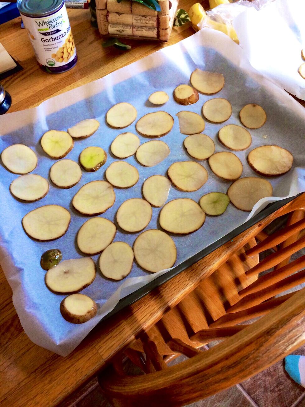 Put each slice on a pan with parchment paper over it. You may put some salt on the slices now. Bake for about 20-25 minutes at 350\u00b0 (f).