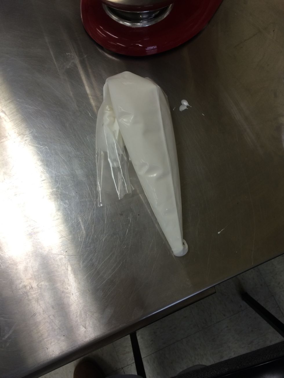 Put egg white mixture into piping bag.
