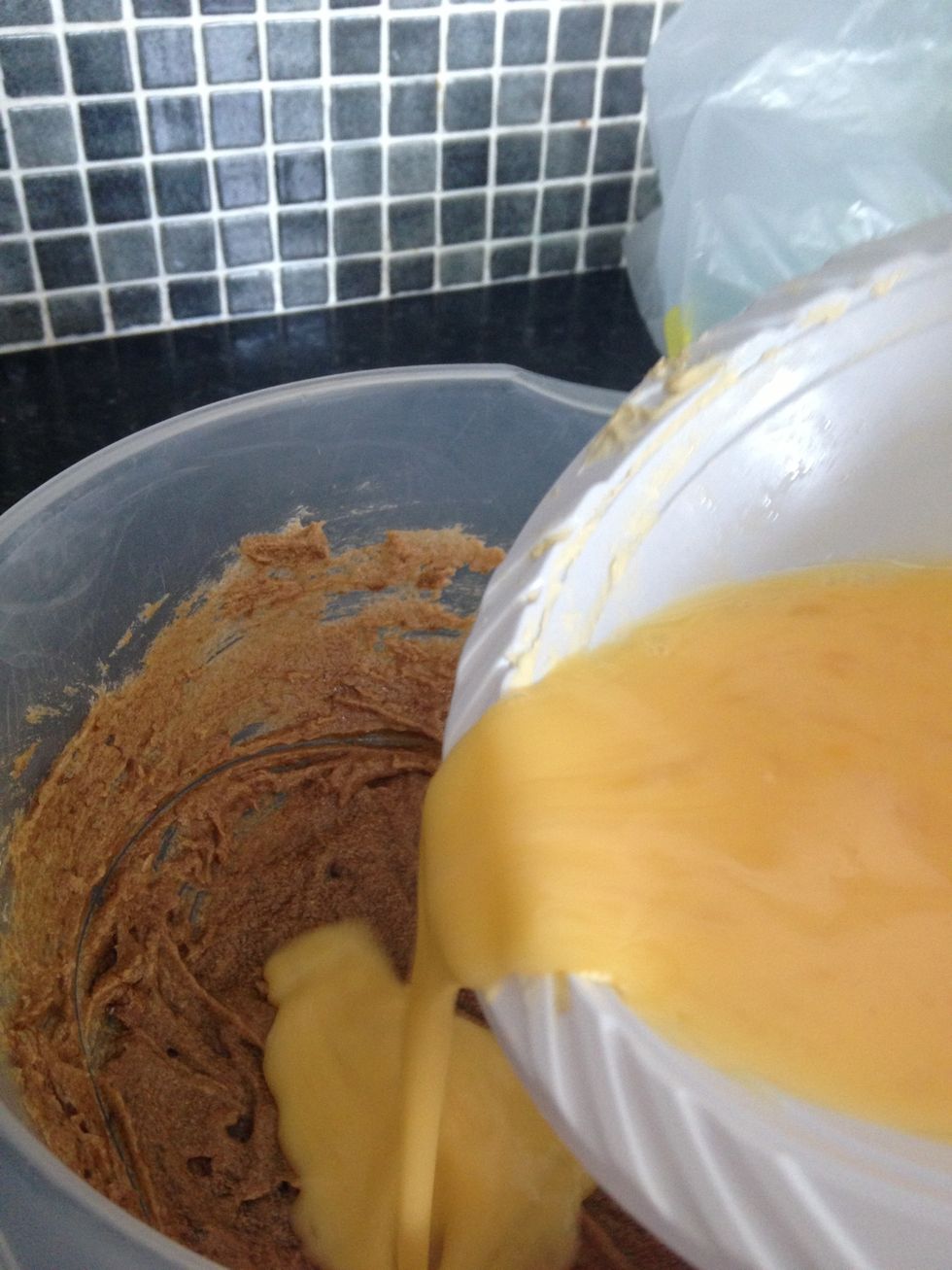 Put eggs in with the brown sugar and butter ( don't worry it's ment to look watery !)