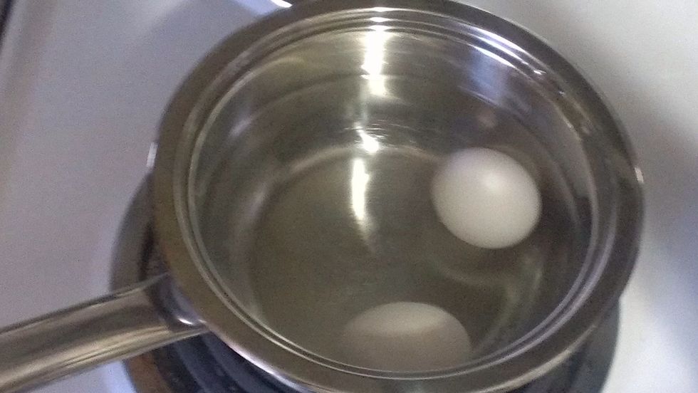 Put eggs on stove top to boil