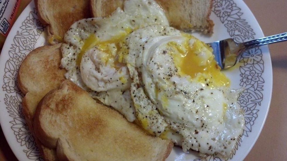 Put eggs onto a serving dish, toast bread & butter lightly. Serve and enjoy!!