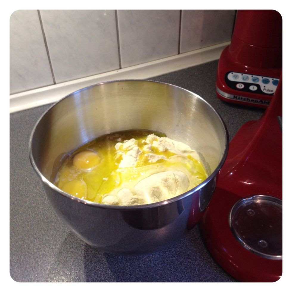 Put everything in a mixing bowl (in Italy I'm sure they do it on the table with the hands ... But this works fine too)