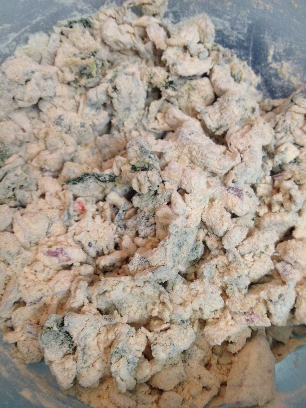 Put everything together and mix well start adding water I used about 1- 1 1/2 cup of water spinach and onions have their water content as well