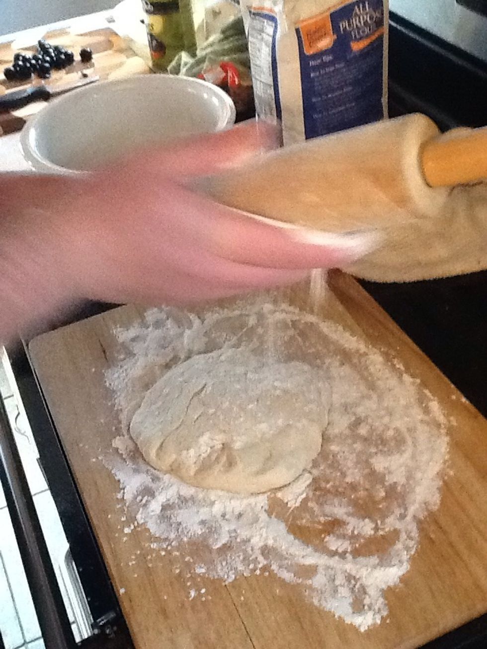 Put flower on rolling pin as well.