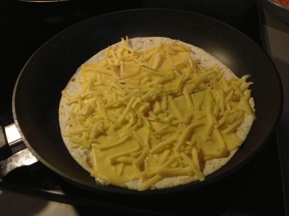 Put fresh tortilla on the frying pan, flip when goldish from one side (step 15 and 16). Put good amount of cheese on top.
