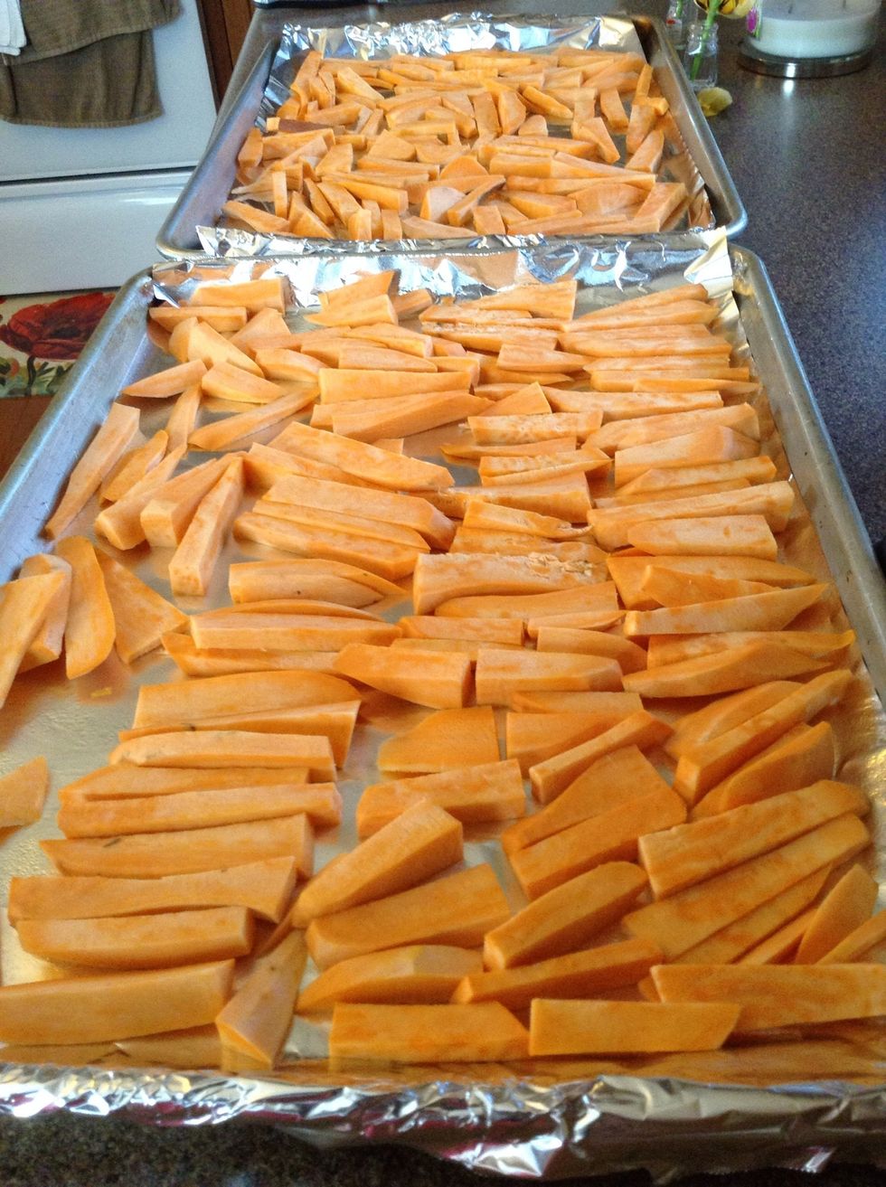 Put fries on sheets, lined up nicely