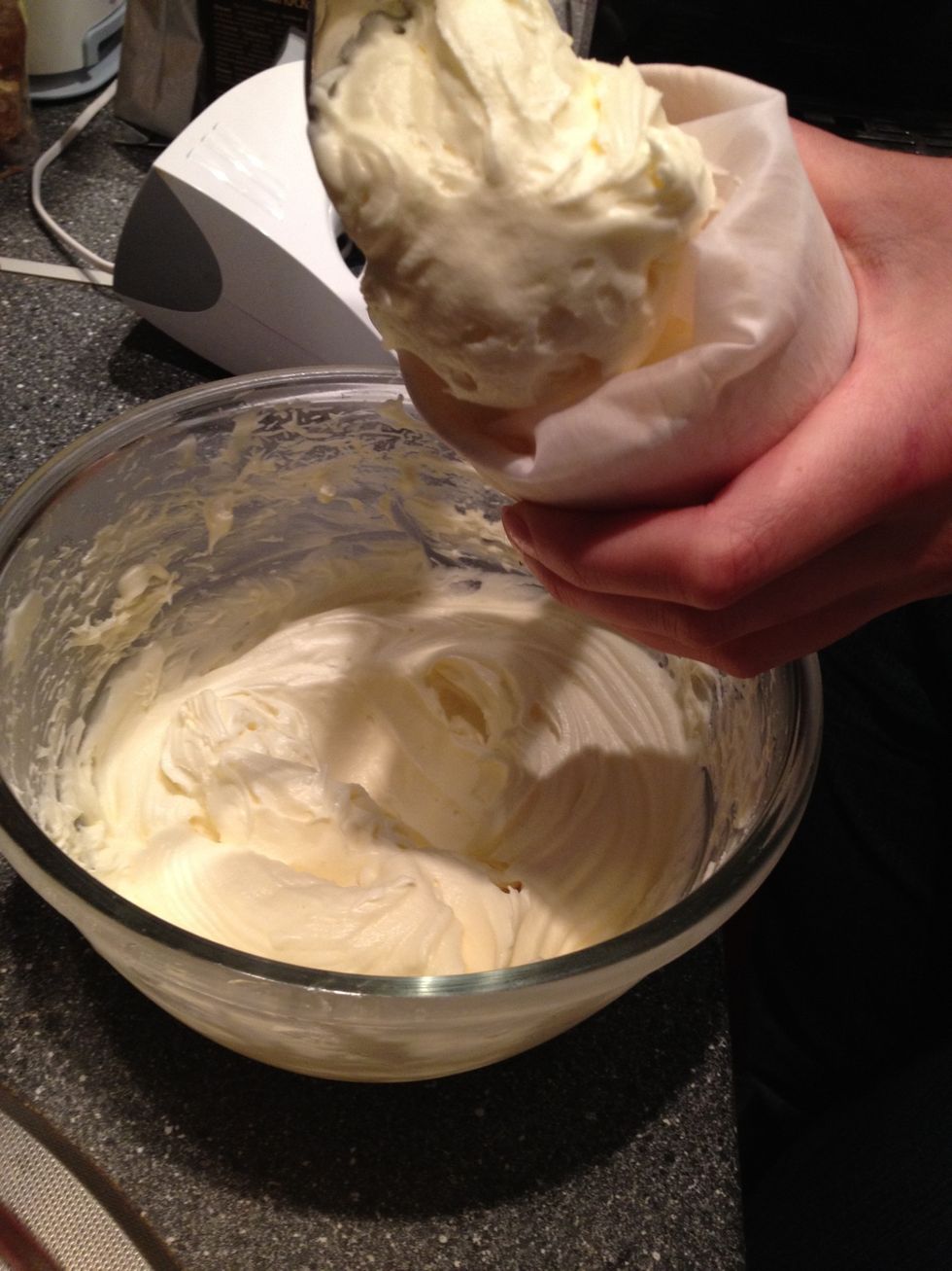 Put frosting in a piping bag