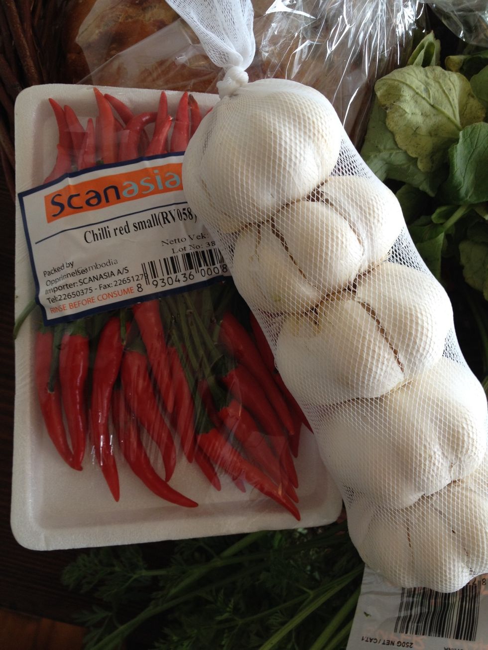 Put garlic and chilis in your basket.