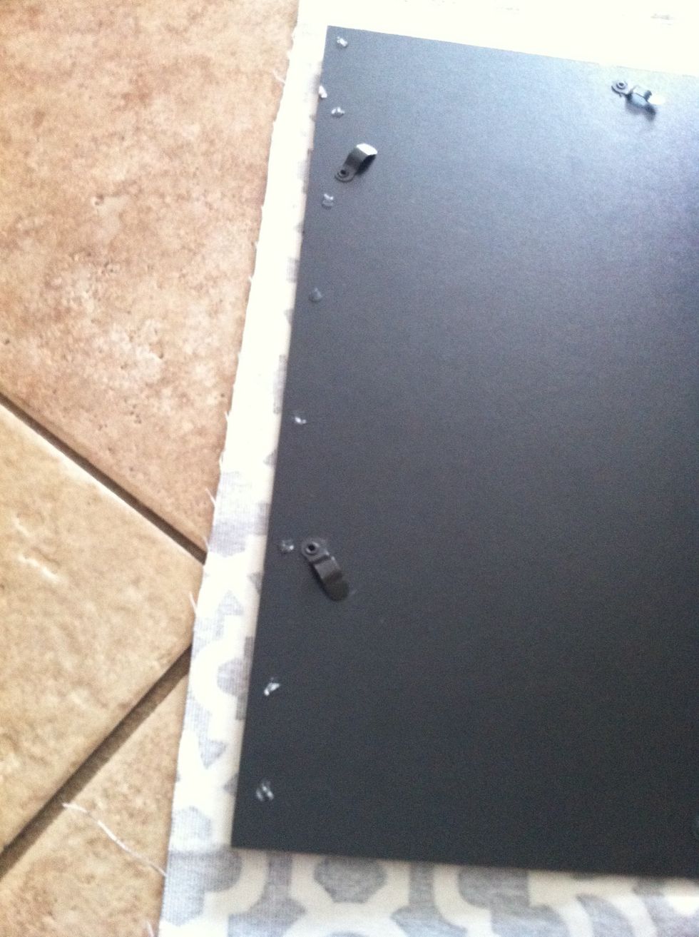 Put glue dots up the sides of the backboard