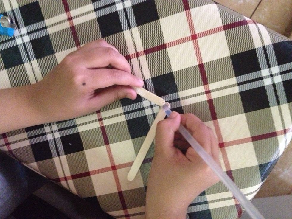 Put glue in each stick