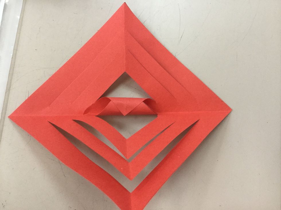 Put glue on one side of the flap and glue them together