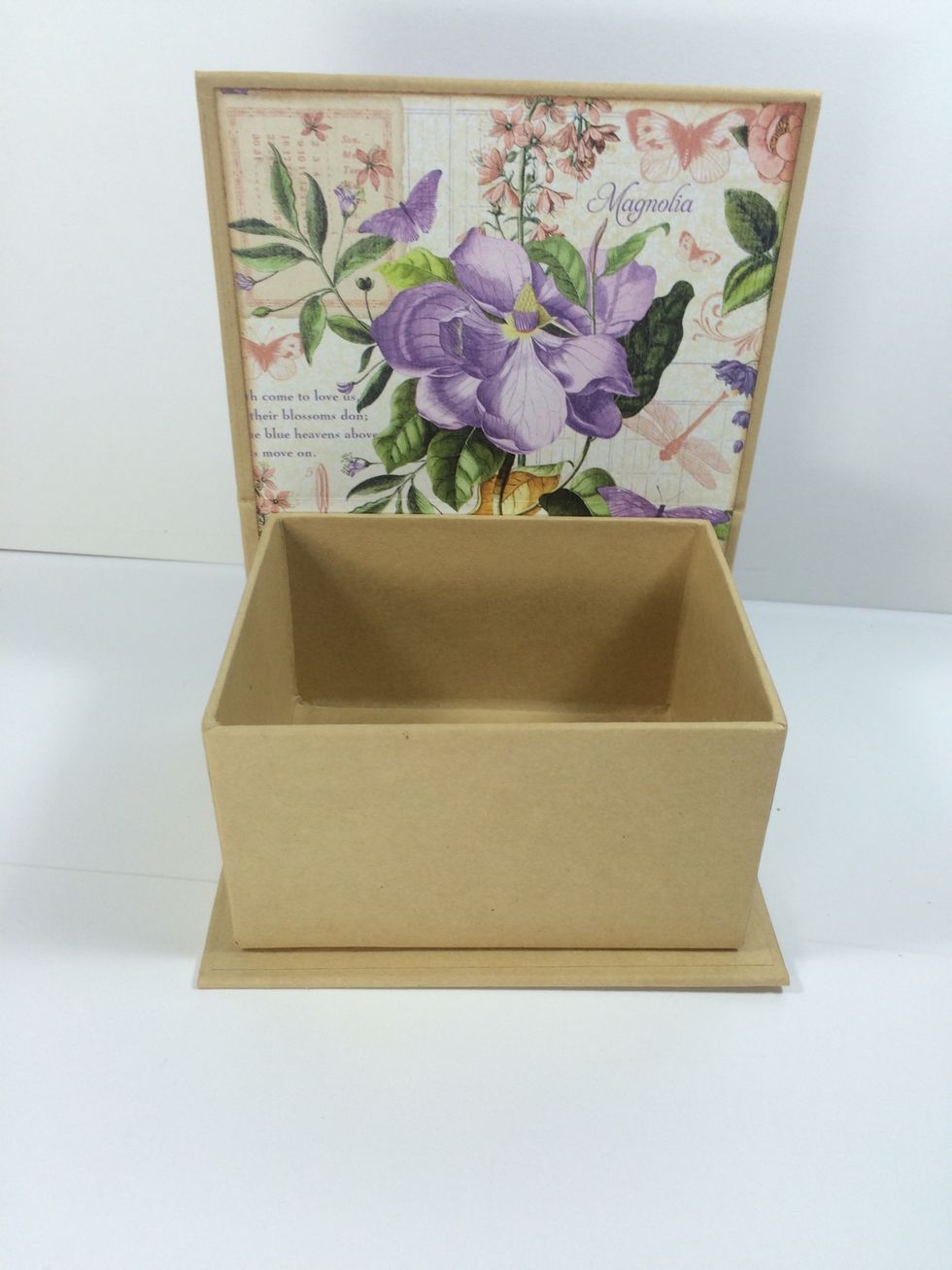 Put glue on the back portion of the box and bring up the back wall to adhere them together. Press and hold until set.