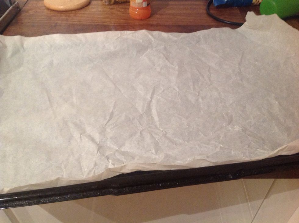 Put grease proof paper on a tray