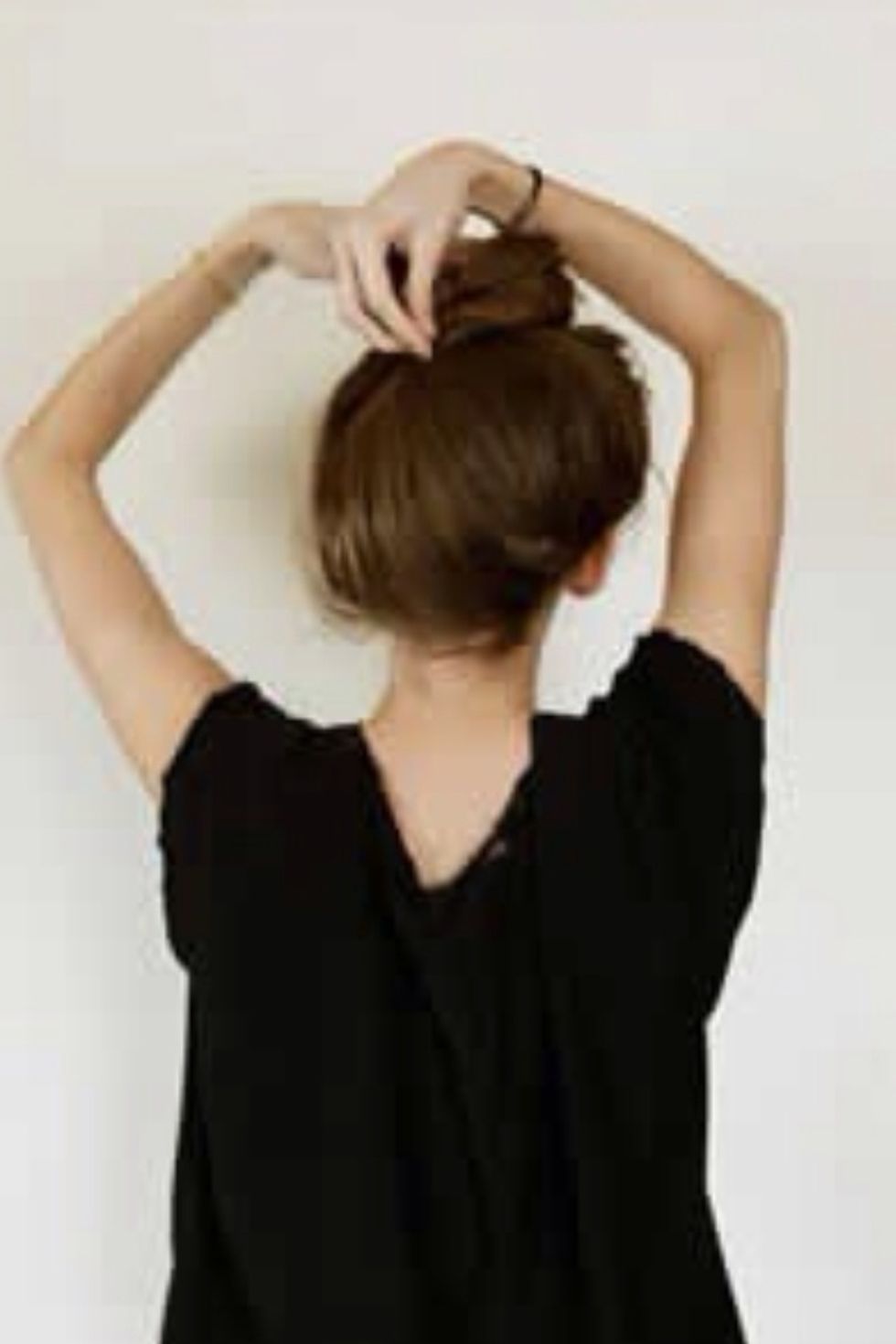 Put hair in hairband if your hair is super thick.  Otherwise twist it around where you want it placed and secure with bobby pins:)
