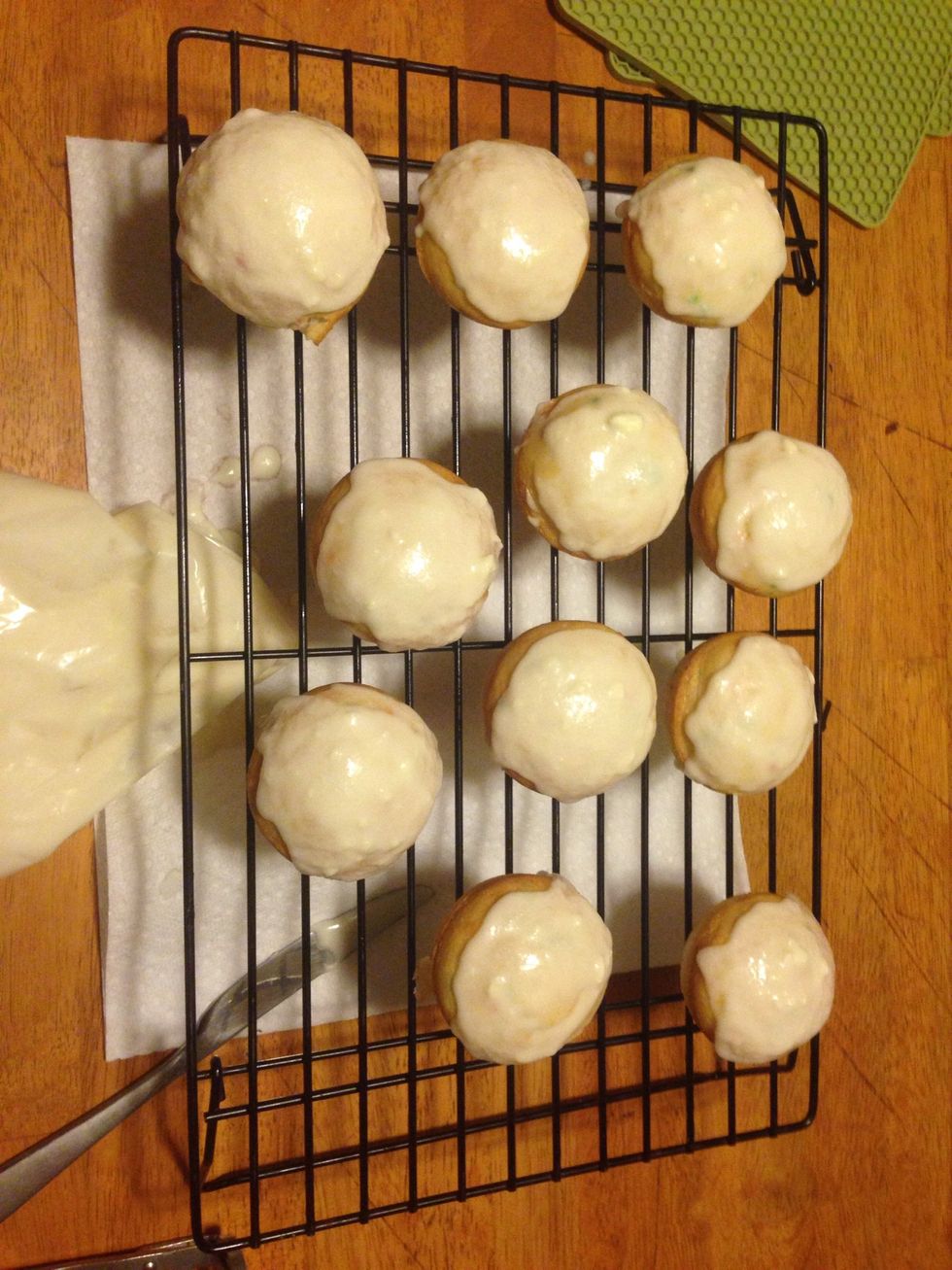 Put icing on the center of each cupcake and then smooth out with a butter knife