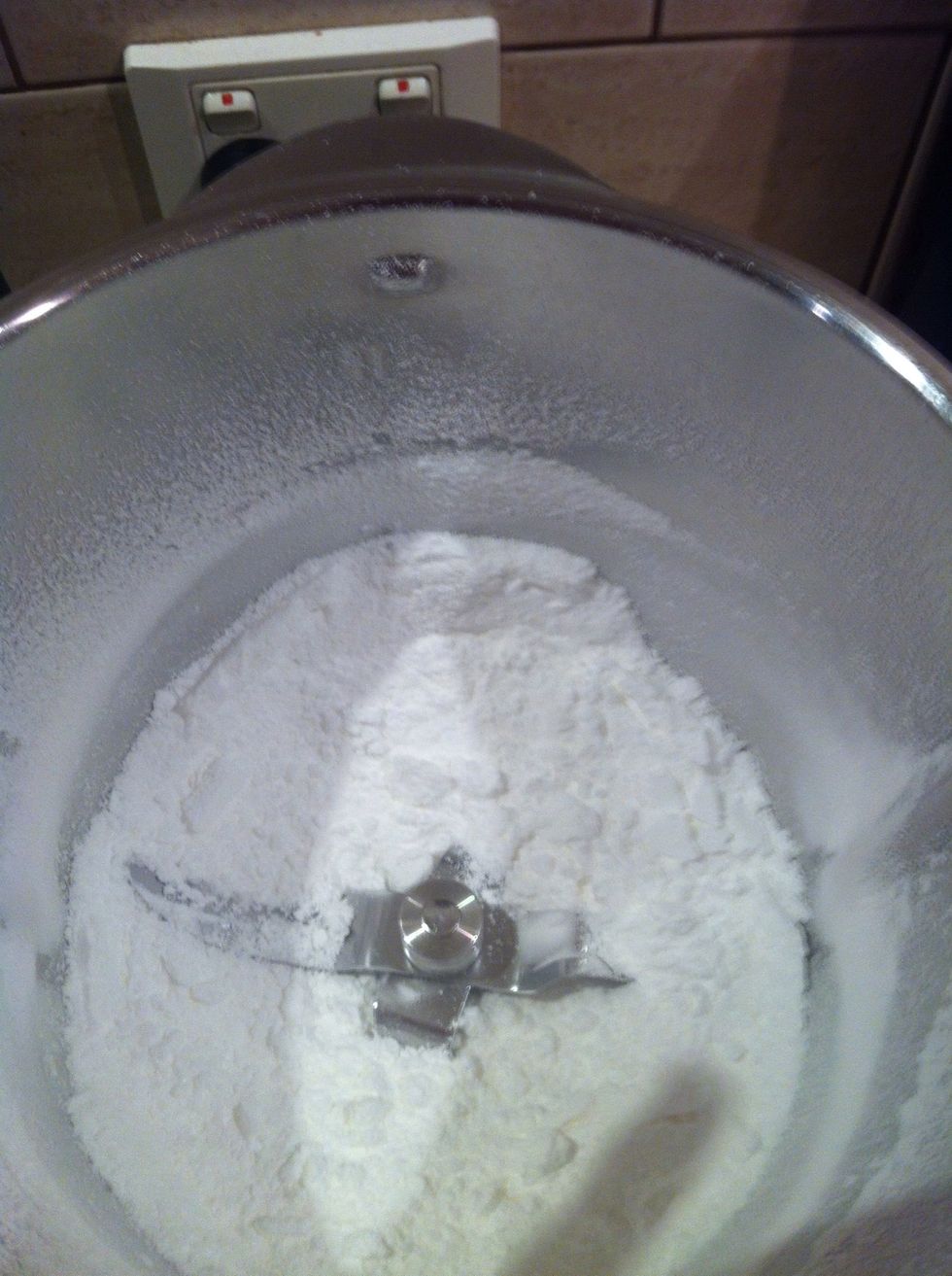 Put icing sugar into your food prossesor