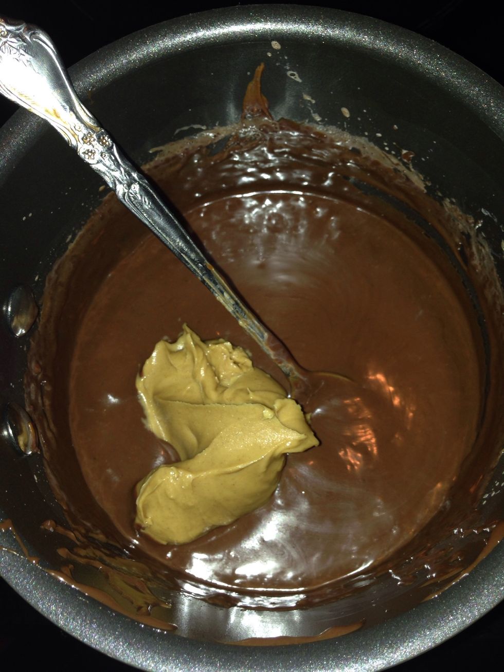 Put in 2-3 heaping spoons if peanut butter stir until smooth