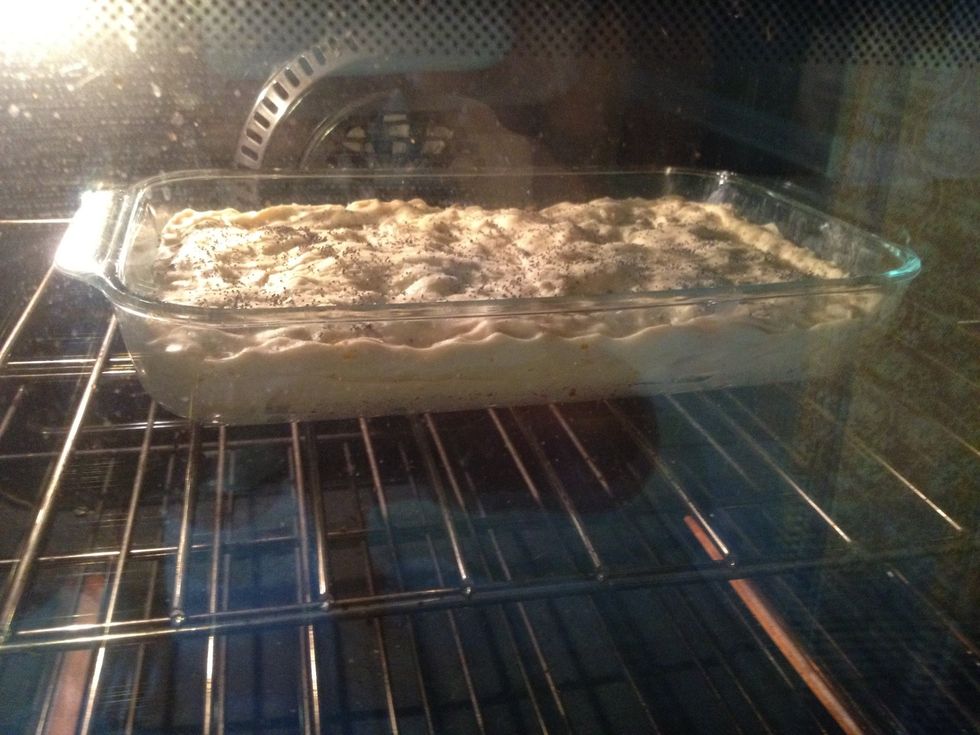 Put in a 376 degree oven until golden brown all over. Don't jump the gun on pulling it out or you will have raw, gooey dough! Let it do its thing! Should take between 25-40 mins depending.