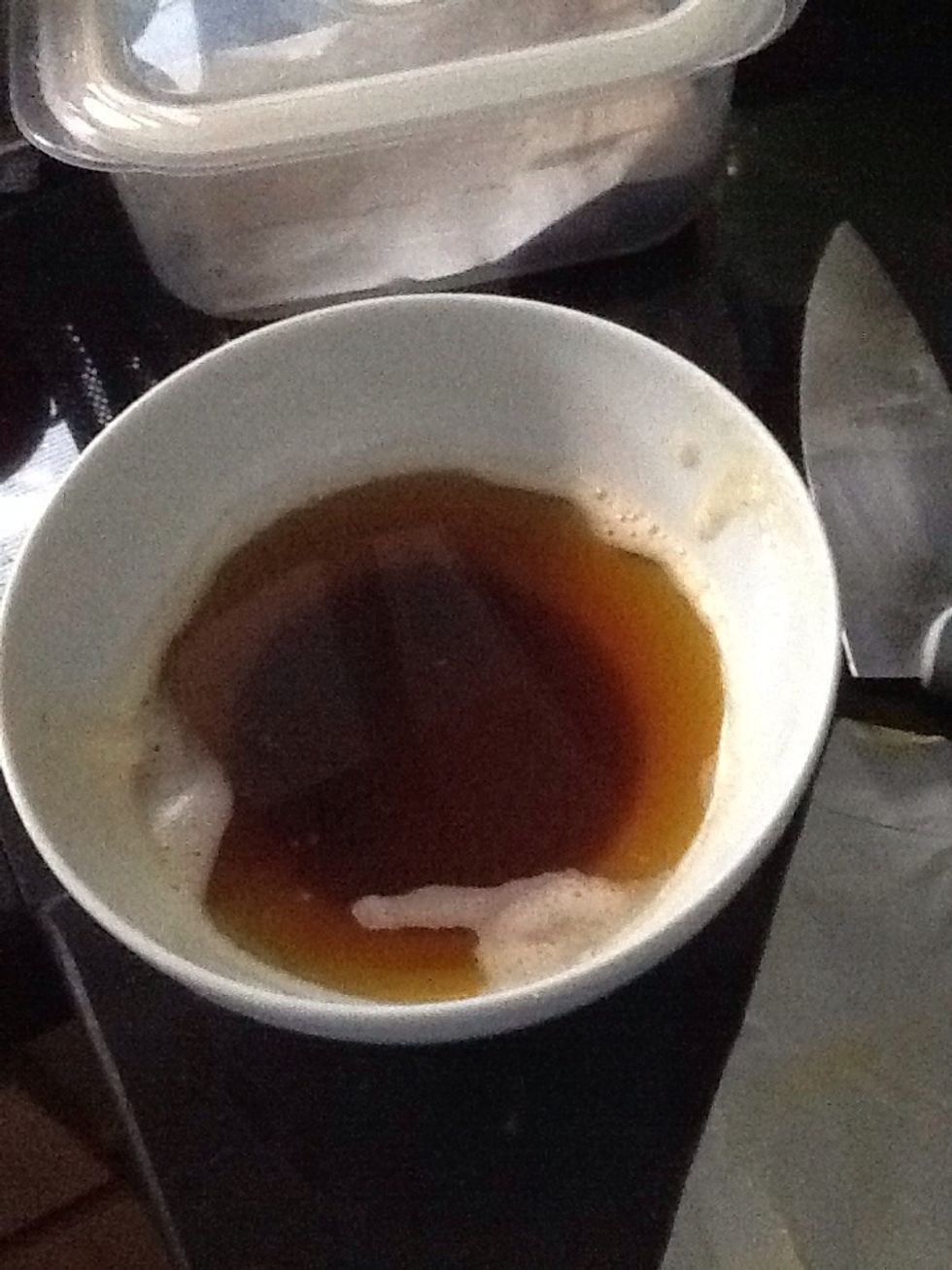 Put in a ceramic or pyrex bowl. Spoon out the white foam. Leave to cool and stick in the fridge for 1 hour