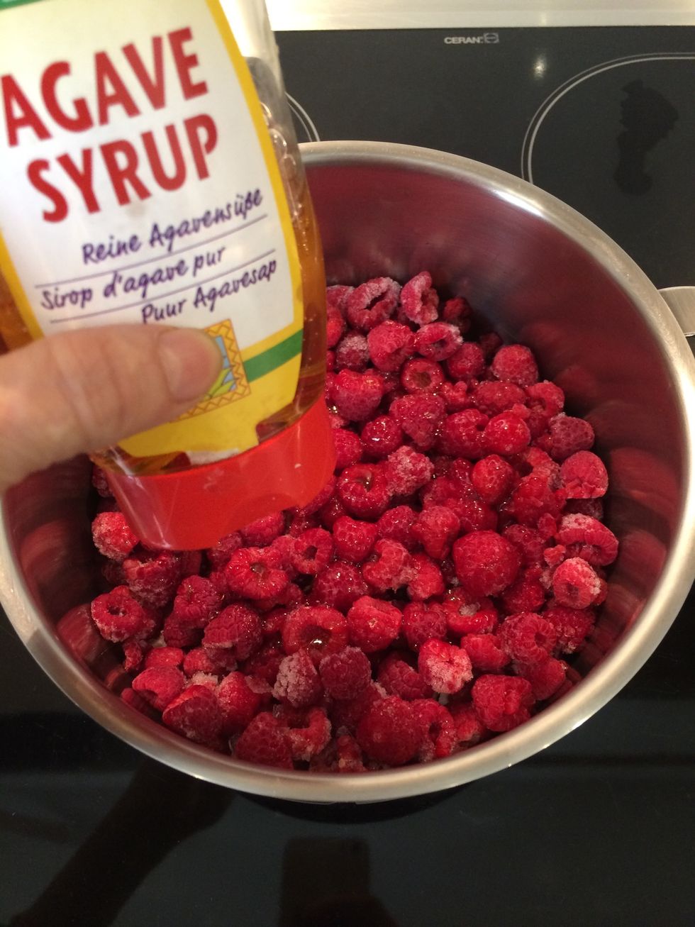 Put in a cooking pot on medium heat. Add agave syrup ( 1 TBsp per 150 g of raspberries) add lemon zest and lemon juice ( 1 lemon per 450 g of raspberries). Cook for 15 mins. Pur\u00e9e with a hand blender