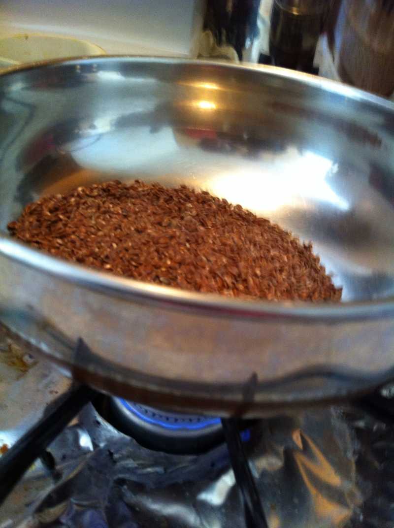 https://guides.brit.co/media-library/put-in-a-pan-and-put-in-on-a-low-flame-stir-for-one-min-flax-seeds-will-start-cracking.jpg?id=24371170&quality=50&width=800