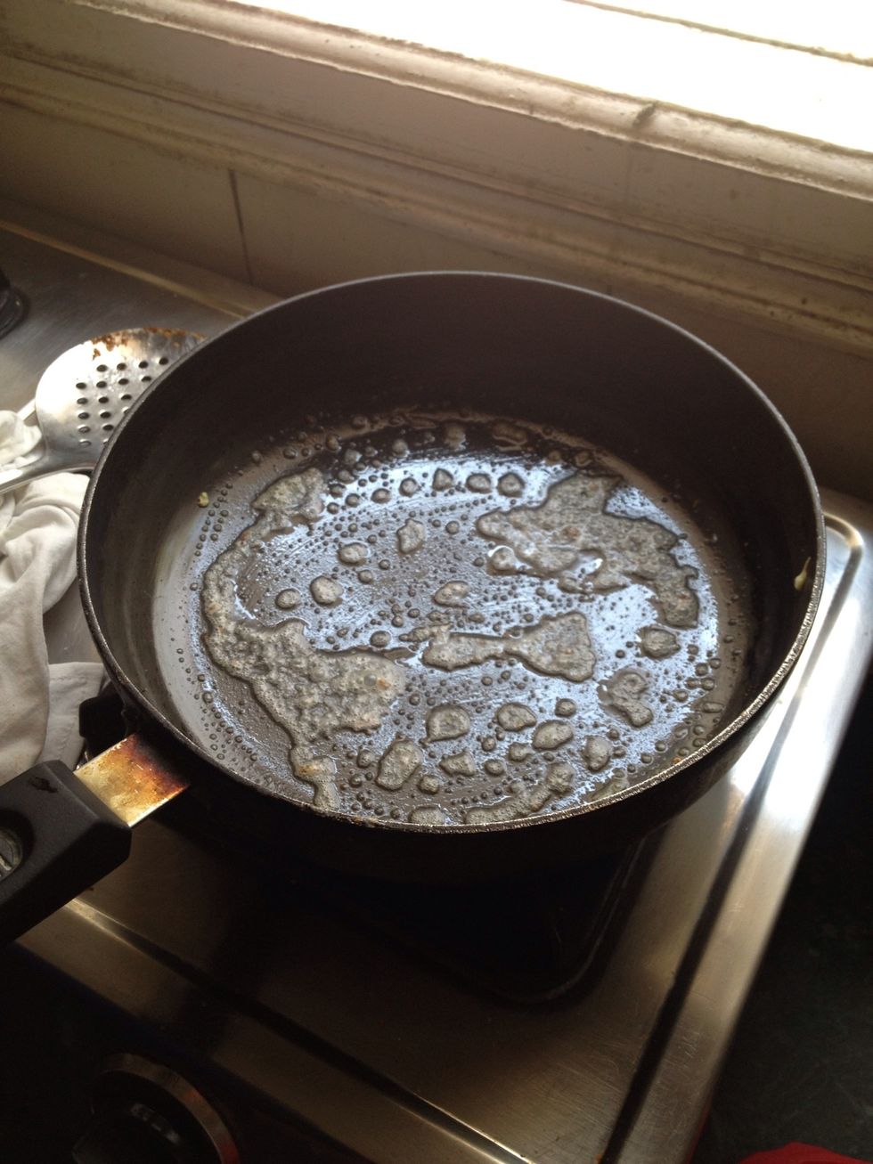 Put in a tablespoon of salted butter in a pan and heat it till it melts