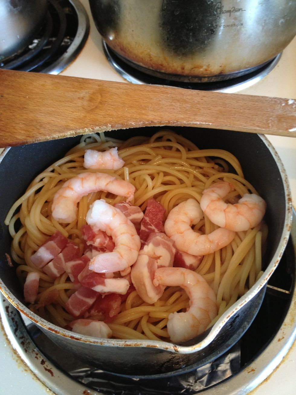 Put in bacon and prawns