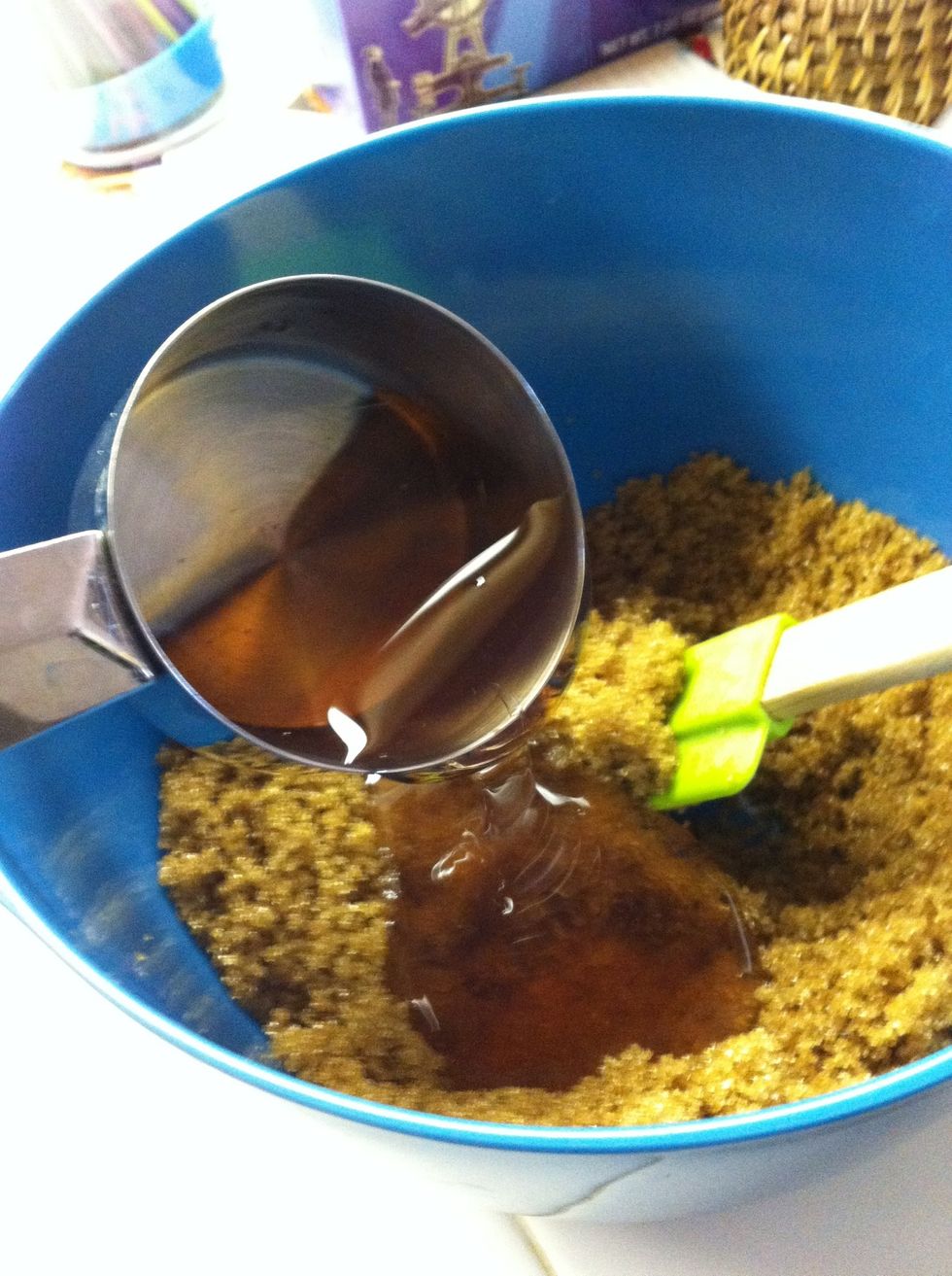Put in half a cup of your essential oil or shower gel, and stir. (this will determine the smell of the scrub, keep this in mind when picking an oil/ shower gel)