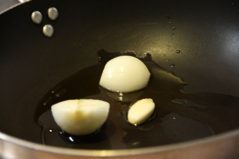 Put in hot pan a fes gloves of garlic