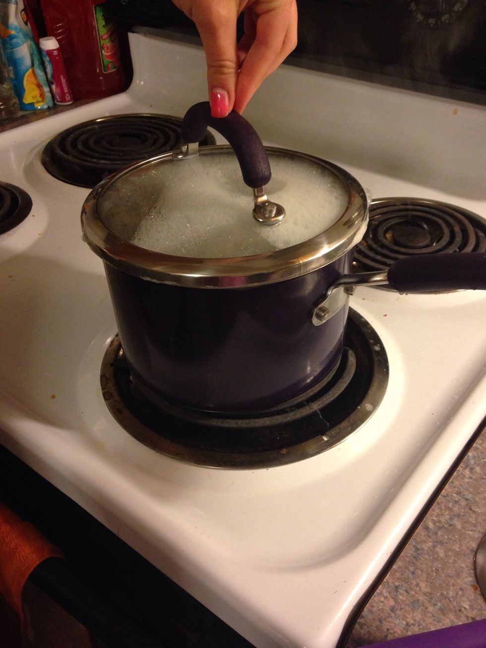 Put in pot with 1 1/4 cups of water per cup of sushi rice. Cook uncovered on high heat till water is boiling. Reduce heat to simmer then cover for 20 mins.