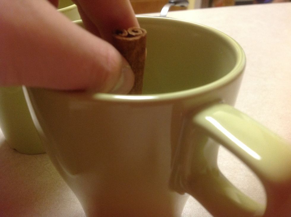 Put in some cinnamon sticks. In each cups.