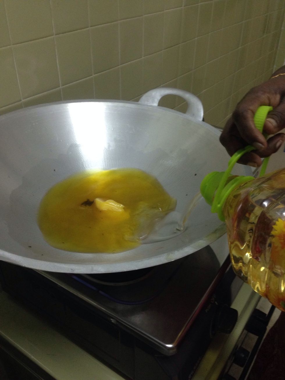 Put in the balance ghee and add some oil to fry the 'batter'.