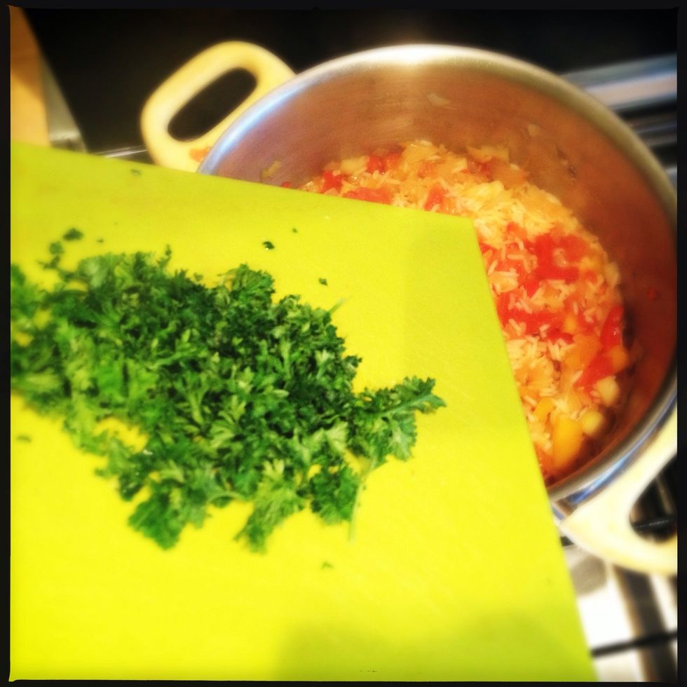 Put in the cut fresh herbs.