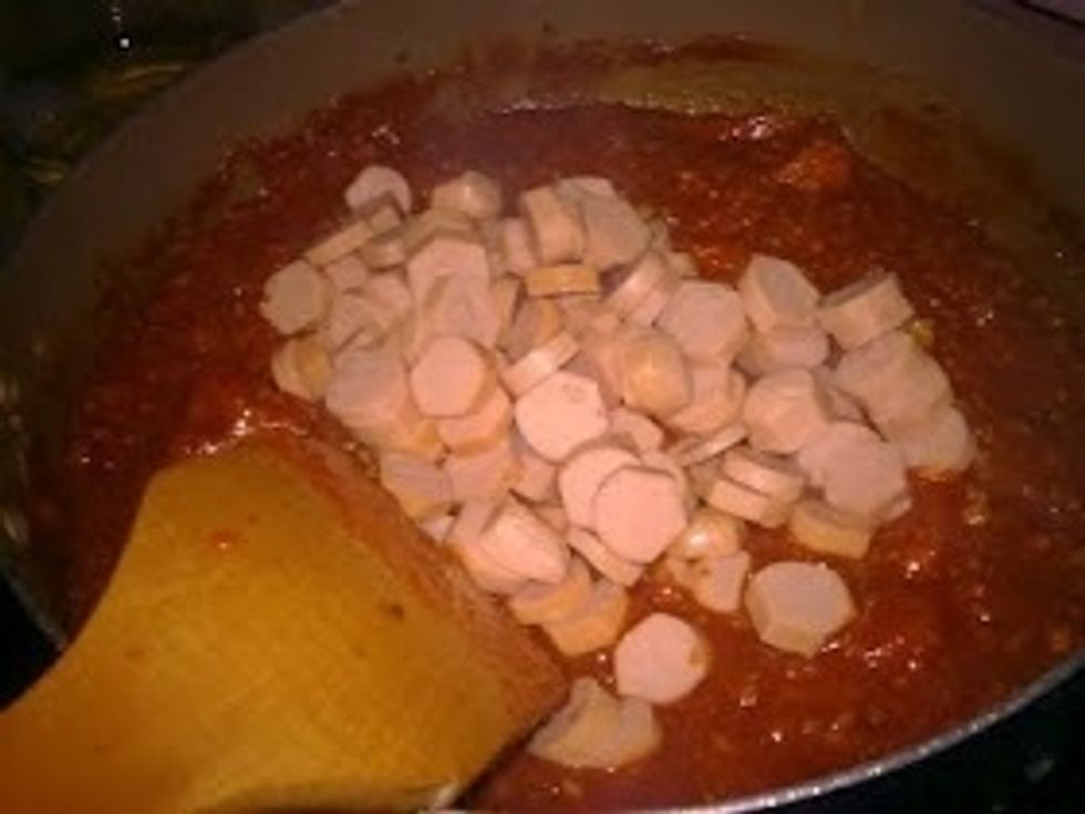 Put in the cut Sausages.