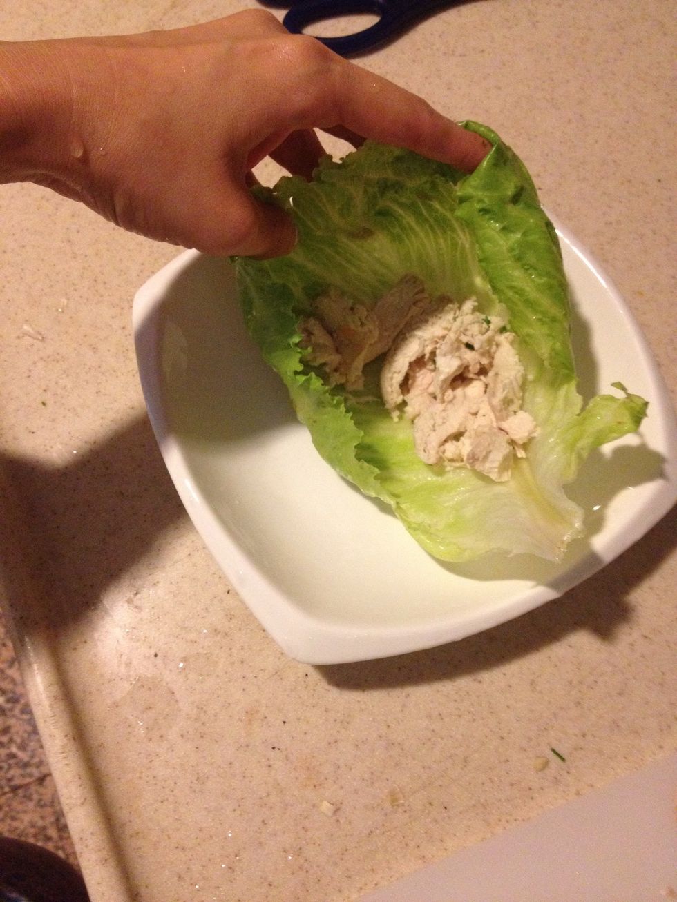 Put in the lettuce leave.