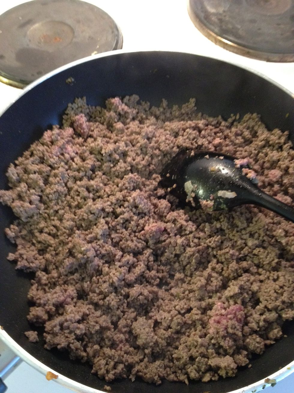 Put in the minced meat and saute until it looks like this. you can use whatever you prefer :) I used moose meat!