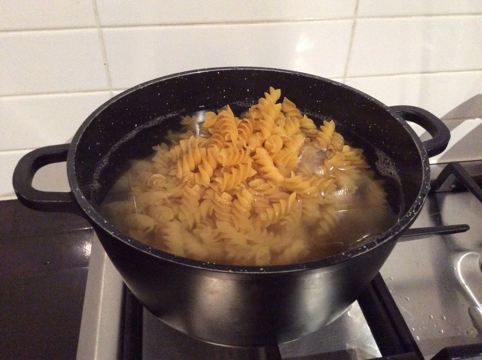 Put in the water and pasta then turn on the stove.