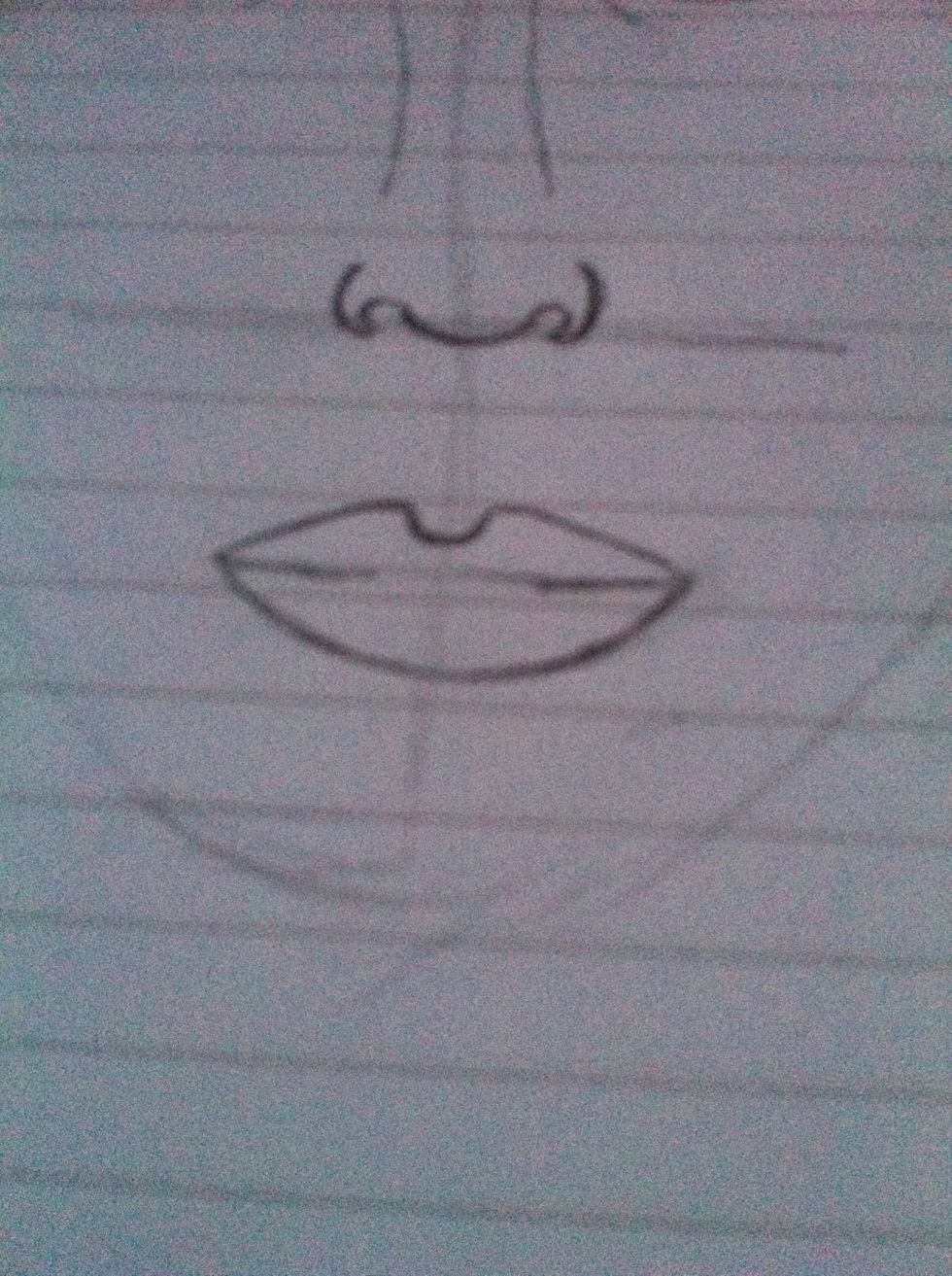 Put in two lines coming in from the corners of the mouth