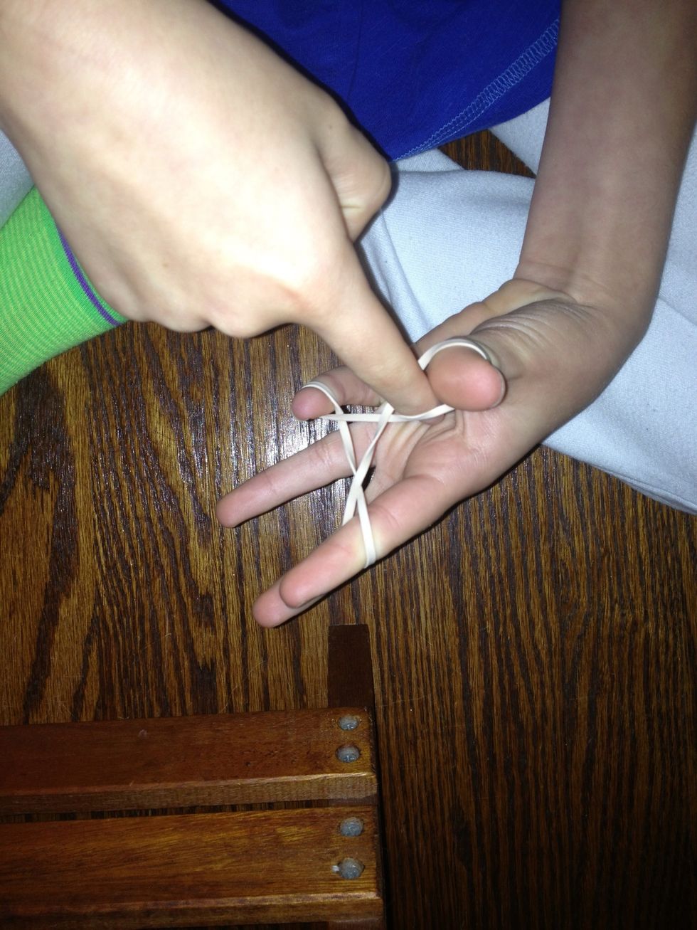 Put index finger in thumb hole