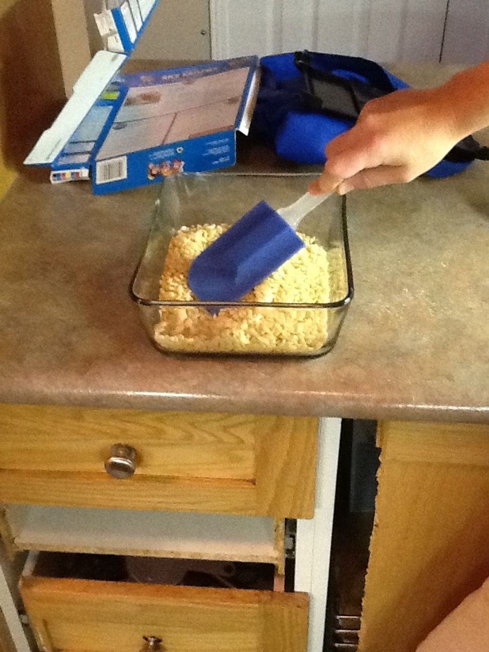 Put ingredients from the bowl into the glass dish
