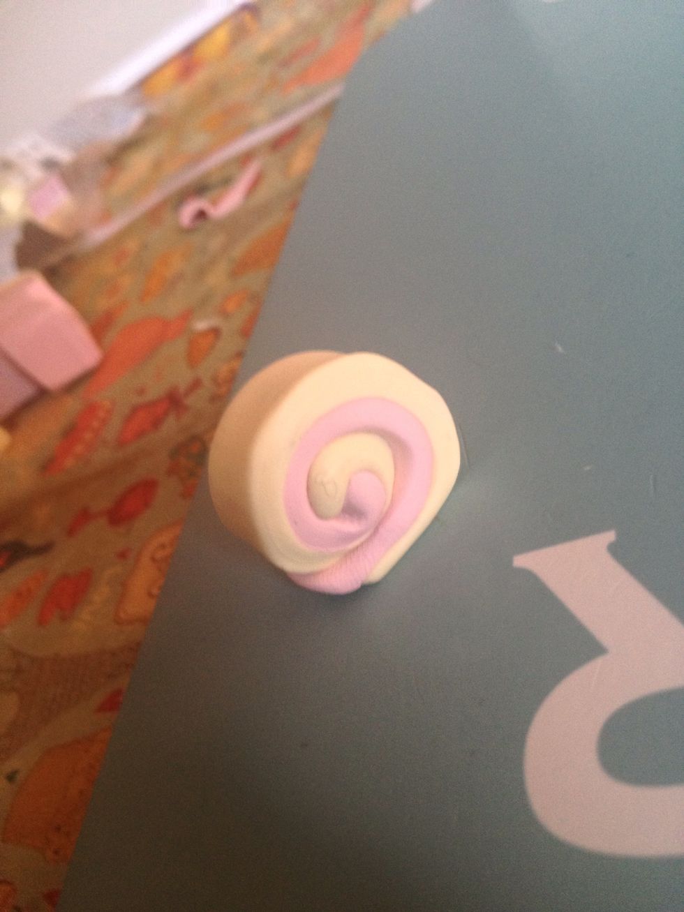 Put it at the bottom and it should look like this. Next put this in the FRIDGE for 5 Mins until its sturdy.