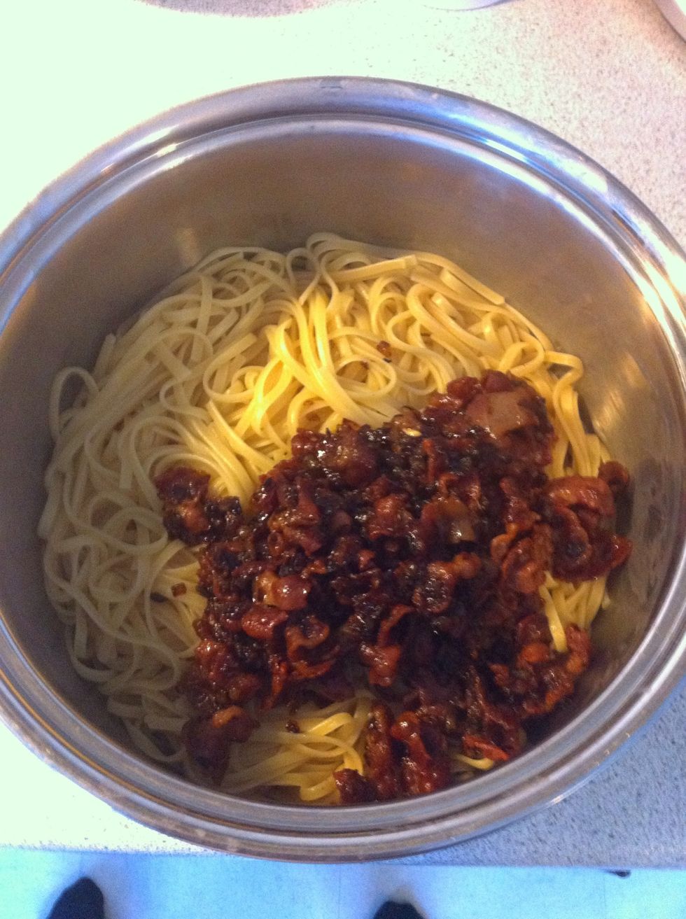 Put it back into the pot and add the bacon mix