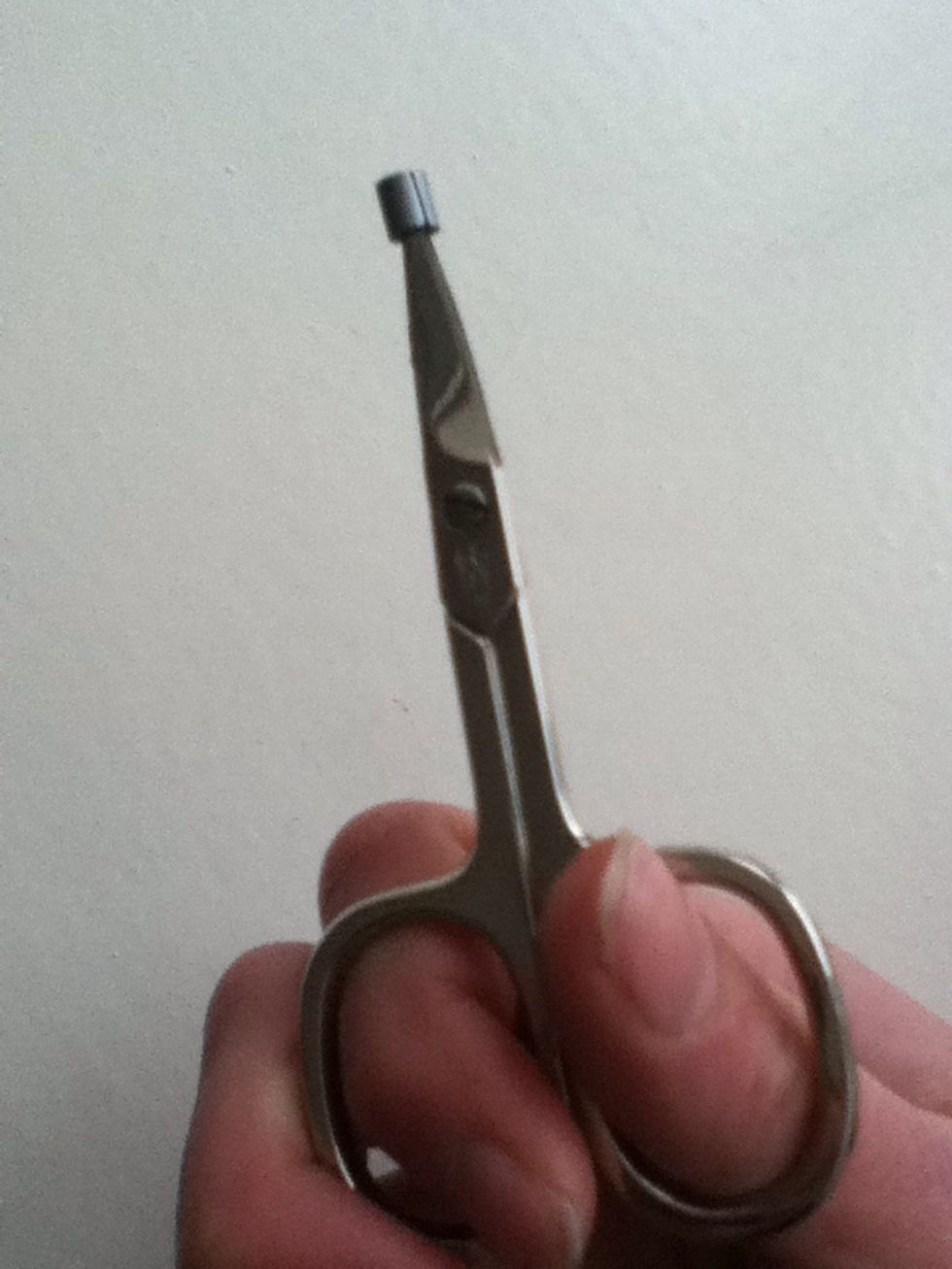 Put it back on the scissor again, Like this.