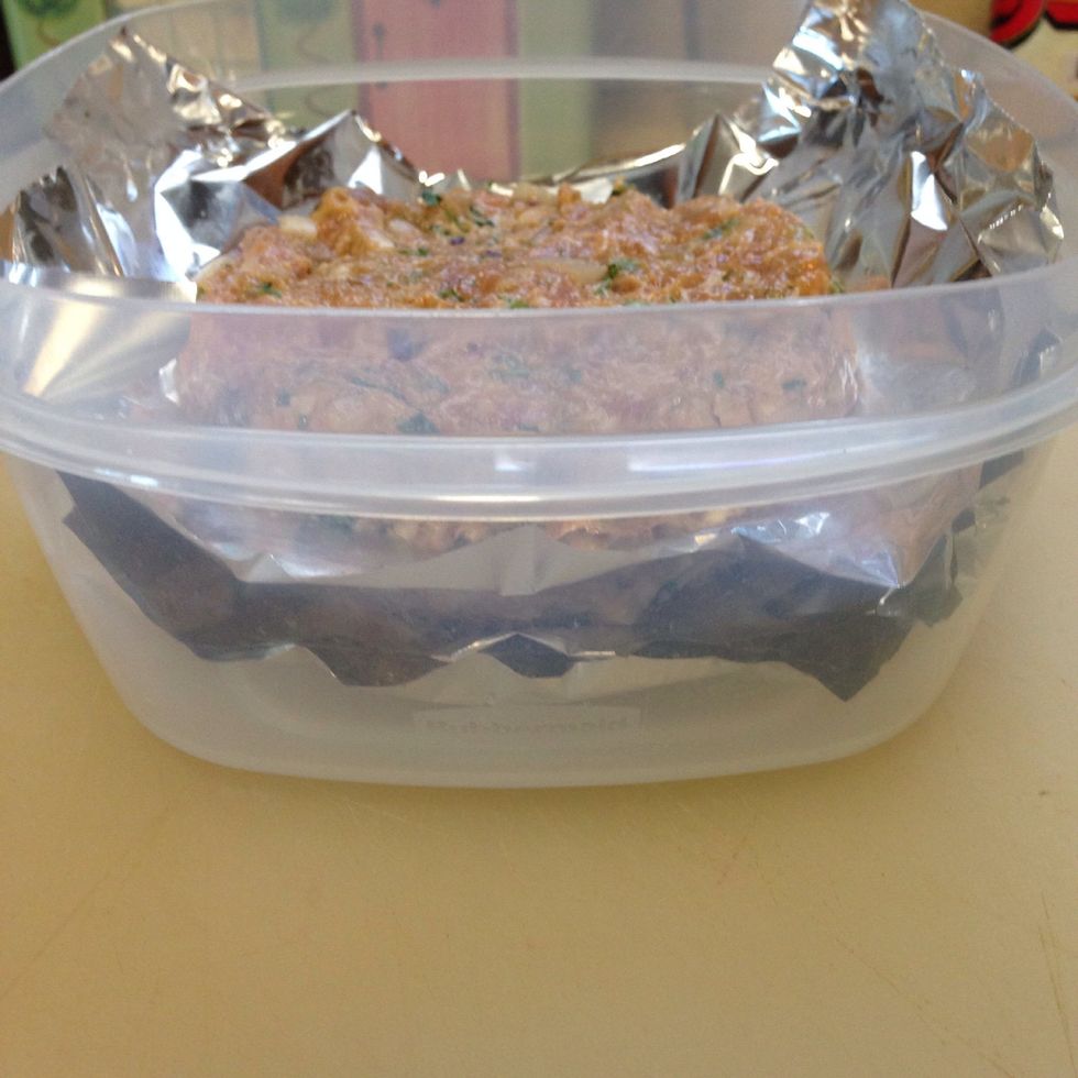 Put it in a box and that's it. Next time you want to use it just lift the foil, one patty At a time and turn it upside down on your grill.