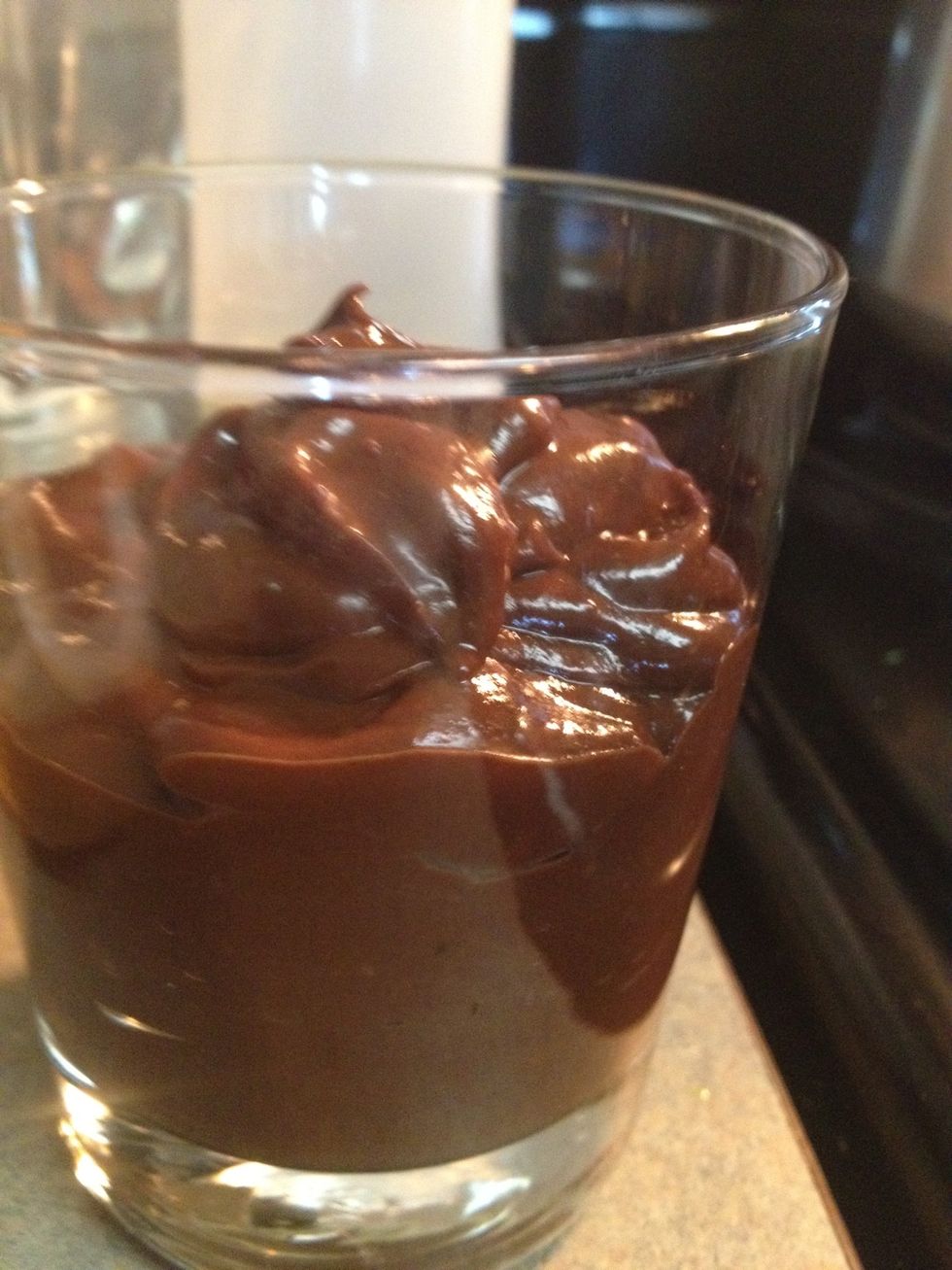 Put it in a glass and refrigerate for 15 mins before serving or enjoy it at room temperature. I liked it more out of the fridge. It did set a little more and was more dense and yum!!!.
