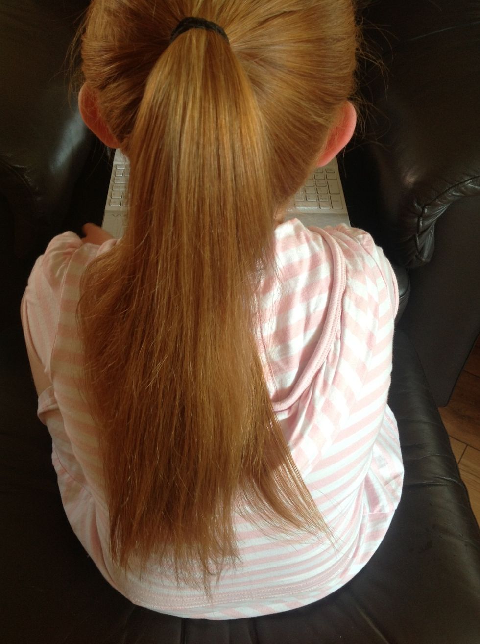 Put it in a neat ponytail on the back of your head