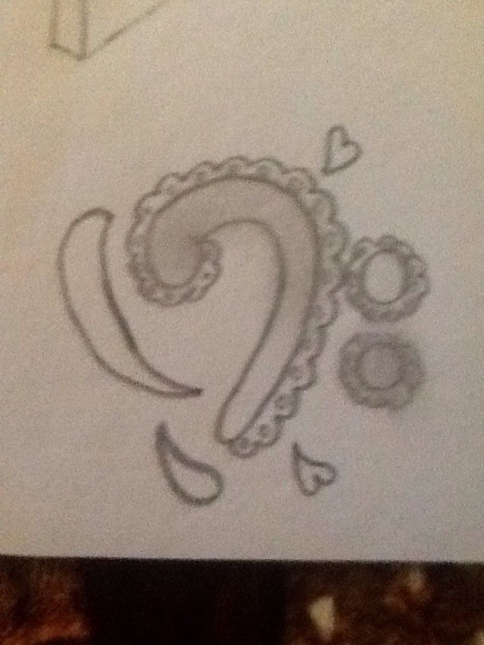 Put it in one of the dots and the oval.