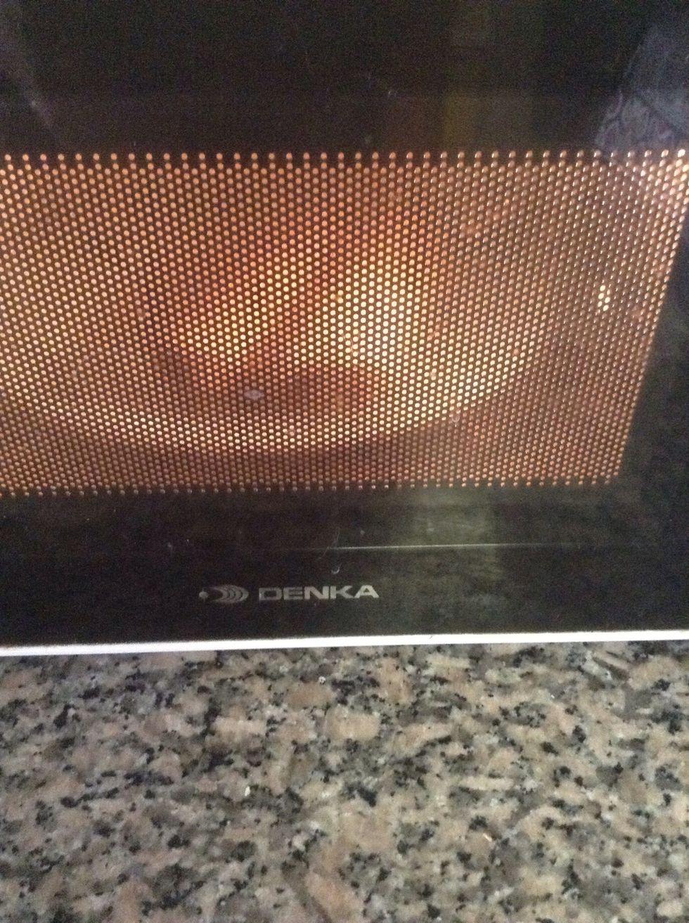 Put it in oven for 1 minute allow the cheese to melt