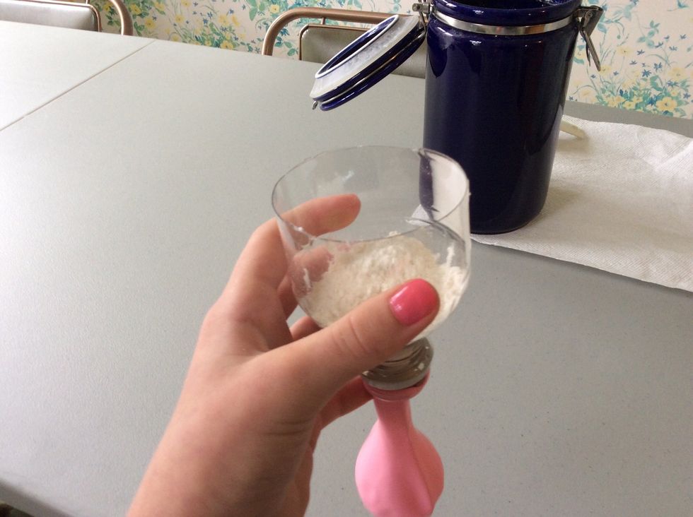 Put it in the funnel thingy